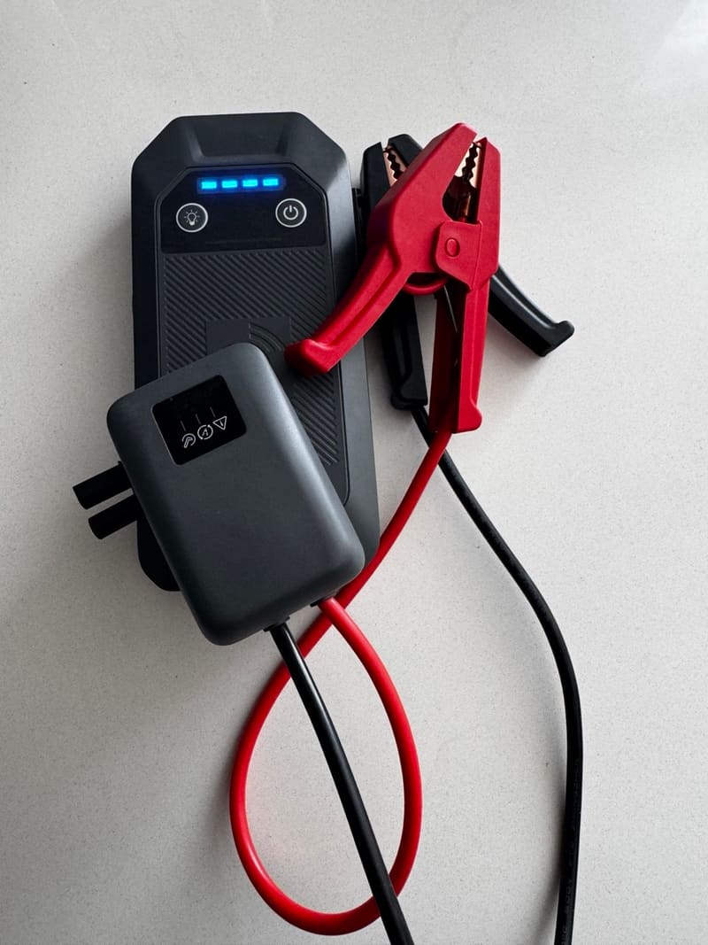 Portable lithium jump starter with smart clamps used by Jump Start Service Phoenix